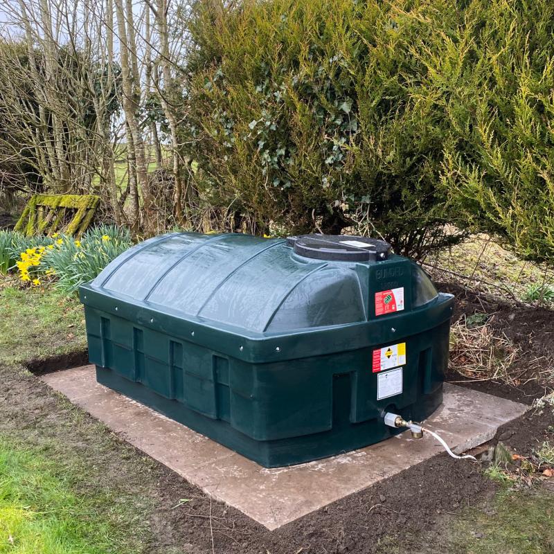 Border Tank Services engineer replacing a domestic oil tank
